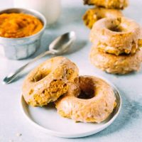 Vegan Pumpkin Doughnuts with Cinnamon Maple Glaze