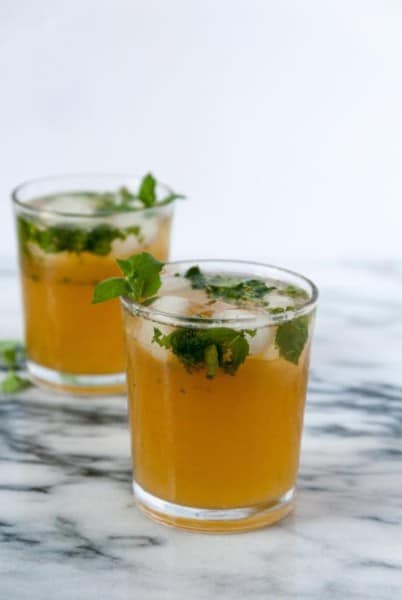 Boozy Green Tea Mint Cooler- A boozy green tea mint cooler that is perfect for capping off the end of summer blues! #drinkthesummer
