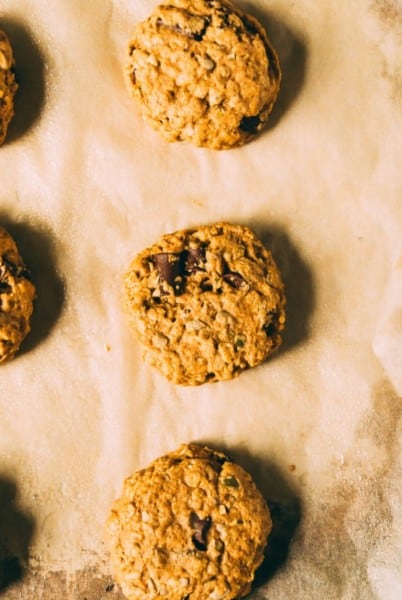 Perfect for snacks or on the go breakfasts, these chewy and hearty vegan breakfast cookies are filled with dried fruit, seeds, and of course, chocolate chunks!